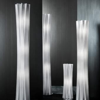 Distinguished Slamp Bach floor lamp with a slim form crafted in white Opalflex® and a fluted symmetrical radial structure