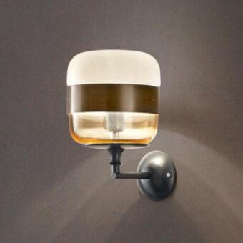 Superior Vistosi Futura wall lamp crafted in translucent amber and opaque white blown glass with a dark matte metal arm