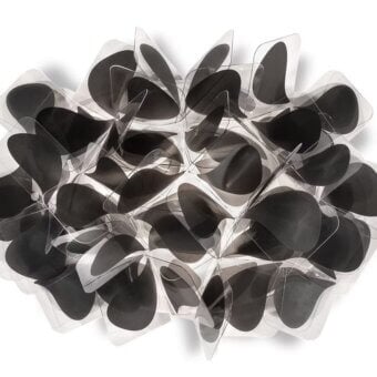 Exceptional Slamp Clizia Wall Lamp is a contemporary design with translucent plastic layers and opaque black tear-drop components creating stark contrast