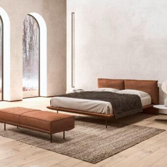 Elegant Presotto Cali bench with smooth light brown fabric upholstery and slim dark metal legs