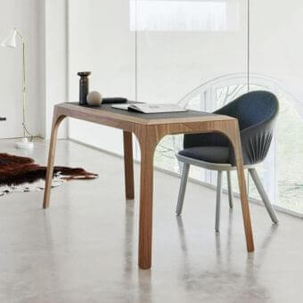 Elegant Presotto Relevè desk crafted in medium-warm wood veneer with a satin finish and darker inset detail