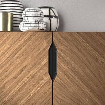 Exclusive Presotto Rho sideboard crafted with Canaletto Walnut veneer and recessed black handles exhibiting a striking diagonal pattern