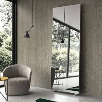 Refined Presotto Tuttospecchio mirror crafted with glass and matte gray-brown wood, exhibiting a contemporary aesthetic with chromed metal feet