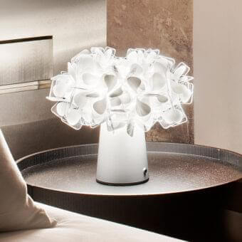 Elegant Slamp Clizia Battery lamp crafted in white with flowing curved lines and a matte finish