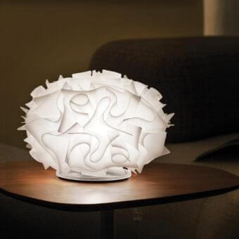 Distinguished Slamp Veli table lamp crafted in translucent Opalflex® with embossed ribbing and glossy base