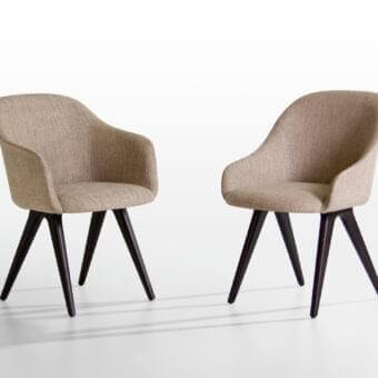 Distinguished Potocco Lyz chair with sinuous lines upholstered in refined beige textile and dark-stained wooden legs