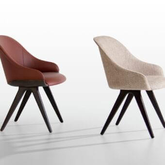Exceptional Potocco Lyz chair with sinuous lines upholstered in lavish light beige textile and dark wooden legs