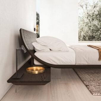 Refined Presotto Aqua bed with curved dark oak veneer and clear methacrylate supports, including a swivel nightstand