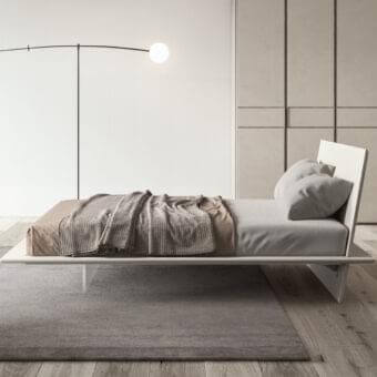Elegant Presotto Plana bed crafted in particleboard with a matte lacquered finish and angled headboard
