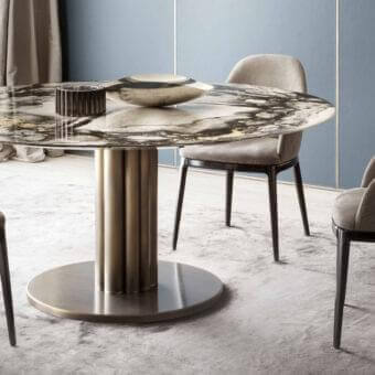 Exceptional Rugiano Forest round table with a marble top displaying black, white and gold tones, built with a brushed bronze finished base