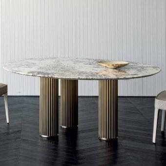 Exceptional Rugiano Liberty table with broadly oval polished marble top and bronze finished aluminum bases
