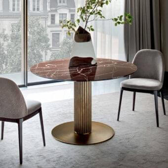 Sophisticated Rugiano Liberty table with reddish-brown marbled top and bronze finished aluminum column base