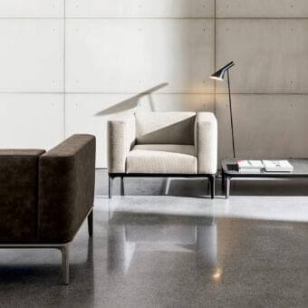 Distinguished Sovet Italia Slim lounge chair with light beige European fabric upholstery and dark lacquered aluminum structure