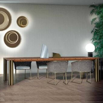 Superior Rugiano Atlante table with richly grained Iroko wood tabletop and skillfully welded polished bronze metal legs