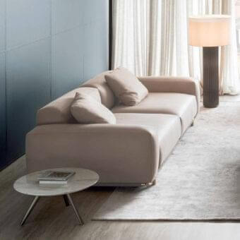Exceptional Rugiano Boheme sofa with warm beige woven fabric upholstery and subtly elevated gold-toned metallic legs