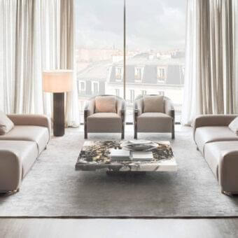 Superior Rugiano Boheme sofa with light neutral upholstery and glossy brass metal structure crafted in smooth leather