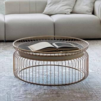 Distinguished Rugiano Ciglia coffee table with glossy gold tubes and dark marble-like glass top built with a rounded metal framework