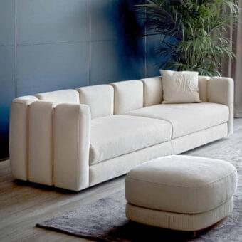 Distinguished Rugiano Club sofa with full textile covering in muted creamy beige and lighter beige trim