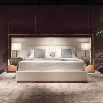 Superior Rugiano Grace bed with light beige textile upholstery, bronze accents and a satin medium-toned brown wood frame