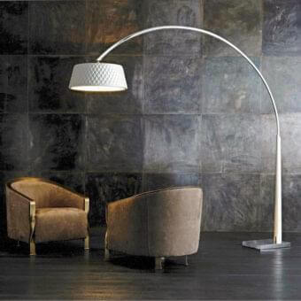 Elegant Rugiano Joanne floor lamp with arched metal structure and quilted off-white textile diffuser in bright chrome finish