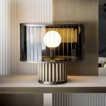 Exclusive Rugiano Liberty table lamp with aluminum base, clear glass cylindrical shade and bronze finish