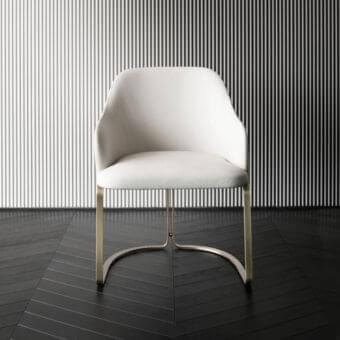 Refined Rugiano Marie armchair with a high-end metal base and smooth matte white textile upholstery