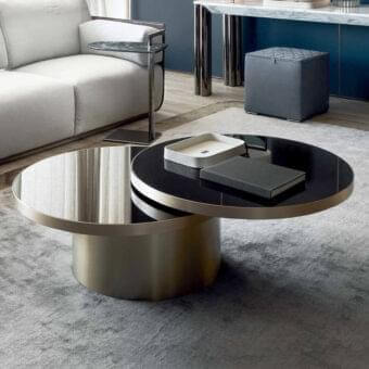 Innovative Rugiano Space coffee table with satin brass base and movable black glass tops creating a minimalist form