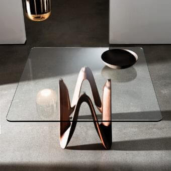 Exceptional Sovet Italia Lambda table with sculpted base in Canaletto walnut wood and clear tempered glass with satin finish