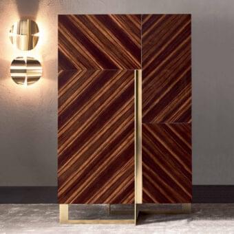 Superior Rugiano Blade cupboard with chevron doors crafted in satin Ebony wood and polished golden metallic base