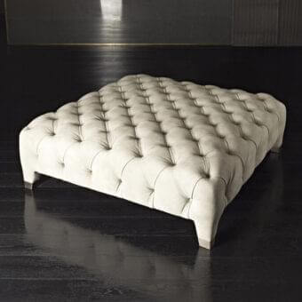 Distinguished Rugiano Cloud ottoman with soft off-white fabric and refined tufted finish built with a dark-toned wood base
