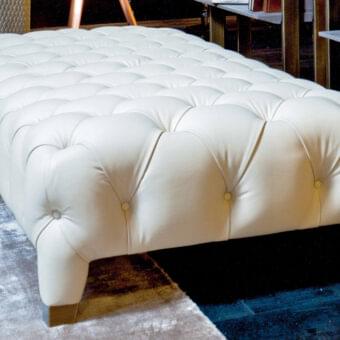 Exclusive Rugiano Cloud ottoman crafted in light cream textile with a refined tufted finish and metallic legs