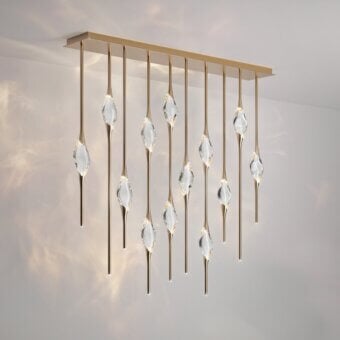 Distinguished Il Pezzo Mancante suspension lamp with thirteen clear crystal diffusers and glossy brass finish