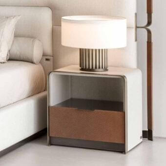 Distinguished Rugiano Grace nightstand with braided leather drawer and light beige synthetic upholstery in a satin gray metallic frame