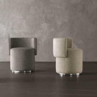 Distinguished Rugiano Love Seat ottoman crafted in Italy with textile upholstery in light and dark grays, beige and white with a satin metal base