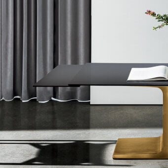 Luxury Sovet Italia Palace table with dark wood tabletop and brilliant gold lacquered metal cantilevered base