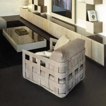 Exceptional Rugiano Braid lounge chair with a braided structure crafted in light beige hide-leather and padded cushions