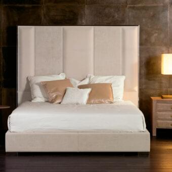 Elegant Rugiano Stripe bed with alternating light cream leather and textured fabric padding, plus warm bronze metal details