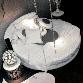 Exclusive Rugiano Venus bed with innovative round design and luxurious leather upholstery in white finish