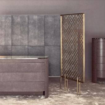 Superior Rugiano Vogue dresser with smooth grey-brown leather and marble top showcasing subtle horizontal grooves