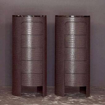 Exceptional Rugiano Vogue dresser with textured leather enveloping a cylindrical form and dark marble top
