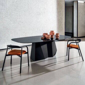 Distinguished Sovet Italia GranDeod table with sculptural lacquered metal and laminated ceramic, exhibiting a sleek black glossy finish