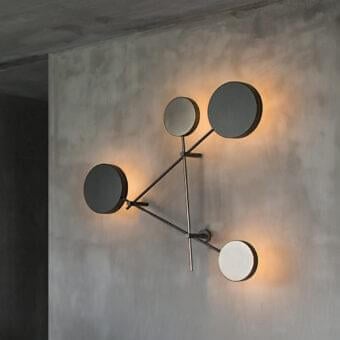 Distinguished Arketipo Iride wall lamp with intertwining discs in micaceous brown metal and titanium finish