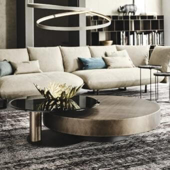 Distinguished Cattelan Italia Arena coffee table with black embossed lacquered steel base and brushed bronze lacquered steel top crafted with clear glass inset