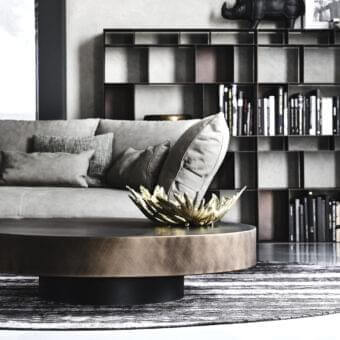 Sophisticated Cattelan Italia Arena coffee table with a shiny round top in brushed bronze lacquered steel and black embossed lacquered steel base