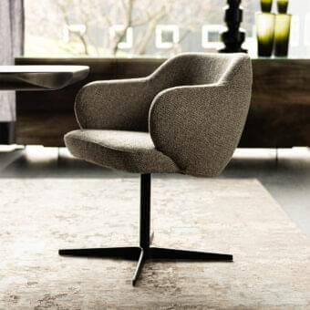 Sophisticated Cattelan Italia Bombè X armchair with muted gray textured fabric upholstery and embossed lacquered dark steel base