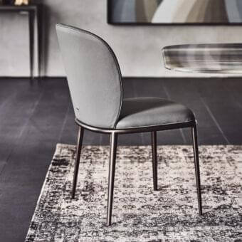 Elegant Cattelan Italia Chris chair with titanium embossed lacquered steel and muted gray fabric upholstery