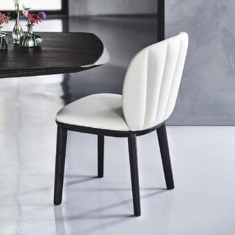 Refined Cattelan Italia Chrishell chair with light textile upholstery and burned oak stained natural ashwood base