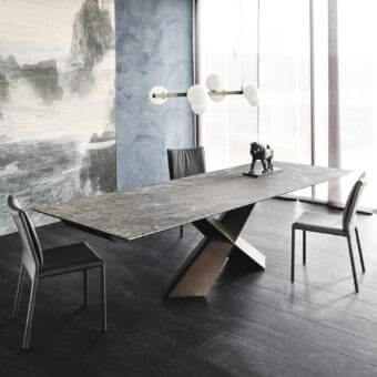 Elegant Cattelan Italia Tyron table with geometric bronze embossed lacquered steel base and Ardesia marmi ceramic top
