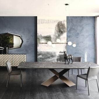 Exceptional Cattelan Italia Tyron table with textured Ardesia ceramic top and embossed lacquered steel X base in bronze finish