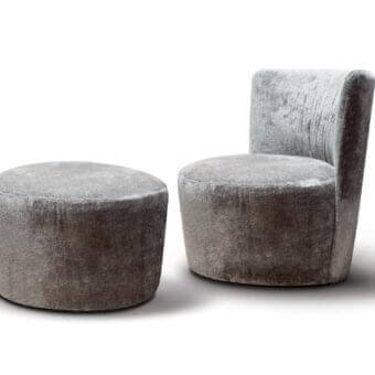 Distinguished Verzelloni Emily lounge chair upholstered in muted gray textile with metal, solid wood, and plywood structure